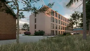 Impressie passantenpension HVO Querido locatie Wenckebachweg 118. Rechthoekig gebouw met 4 lagen.